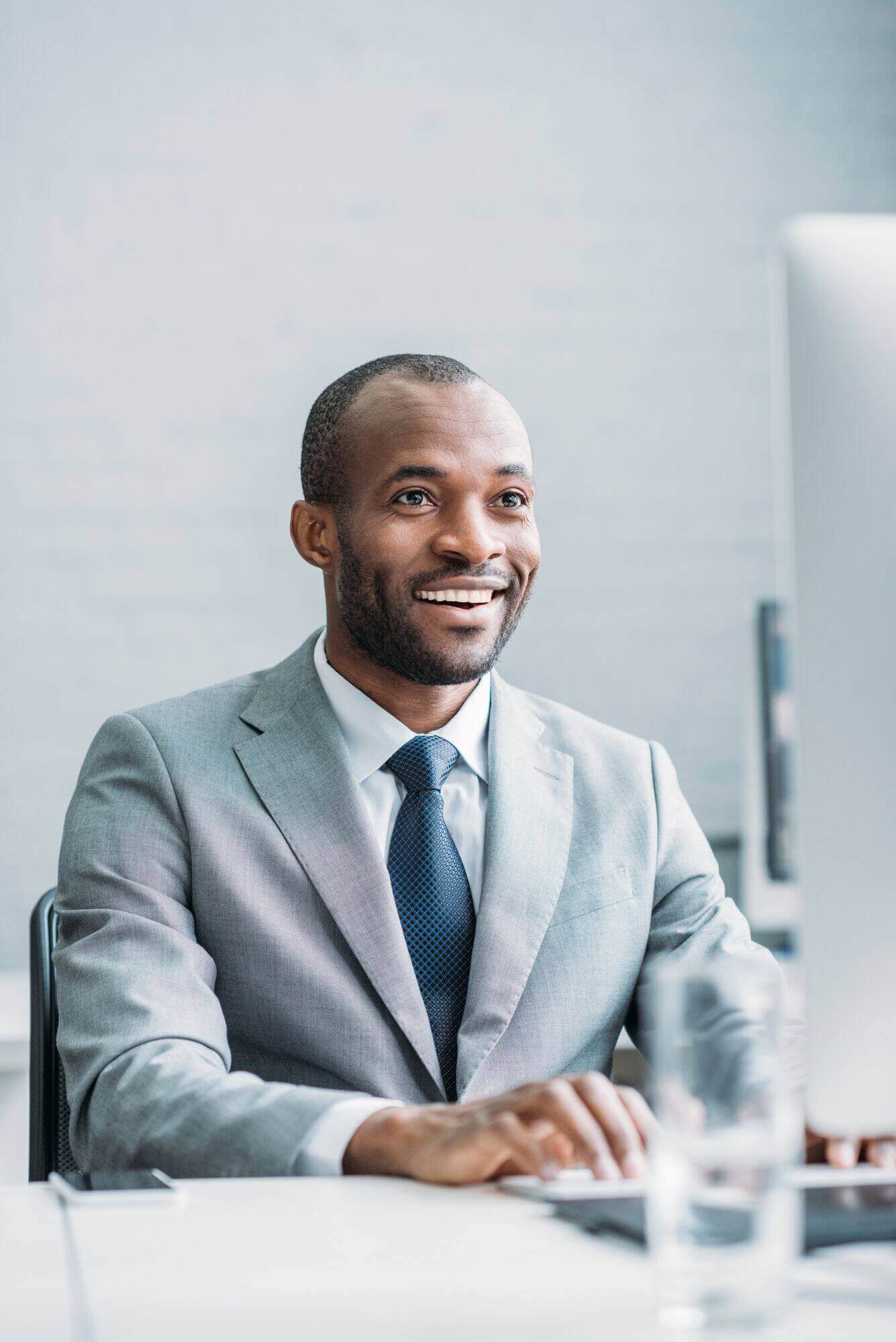 portrait-of-smiling-african-american-businessman-w-2024-11-18-10-23-22-utc.jpg